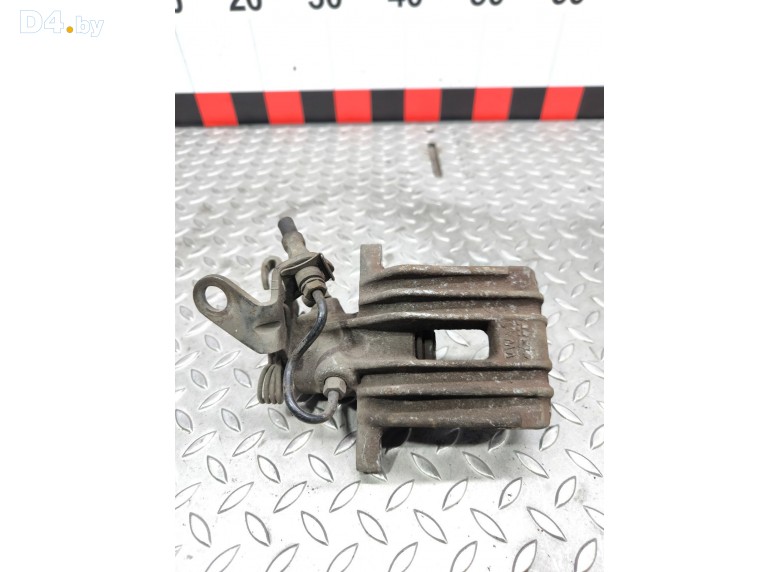 Суппорт задний левый к Volkswagen Golf undefined г.