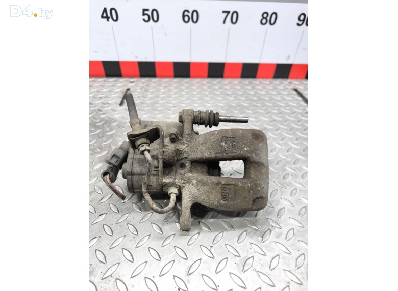 Суппорт задний левый к Volkswagen Passat undefined г.