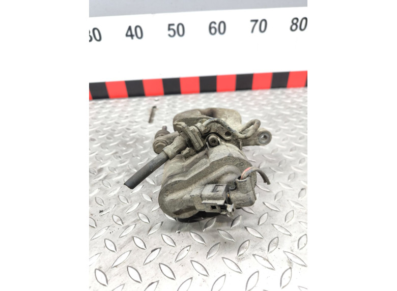 Суппорт задний левый к Volkswagen Passat, 2008г.