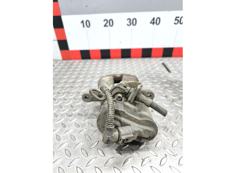 Суппорт задний правый к Volkswagen Passat, 2008г.