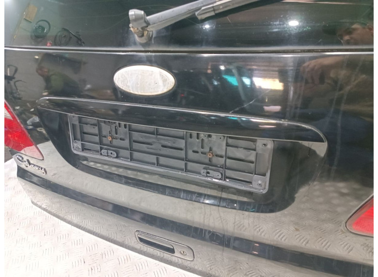 Накладка подсветки номера к Ford Galaxy, 2003г.