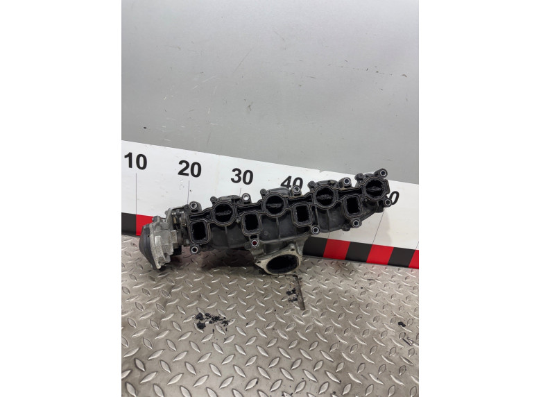 Коллектор впускной к Volkswagen Passat, 2010г.