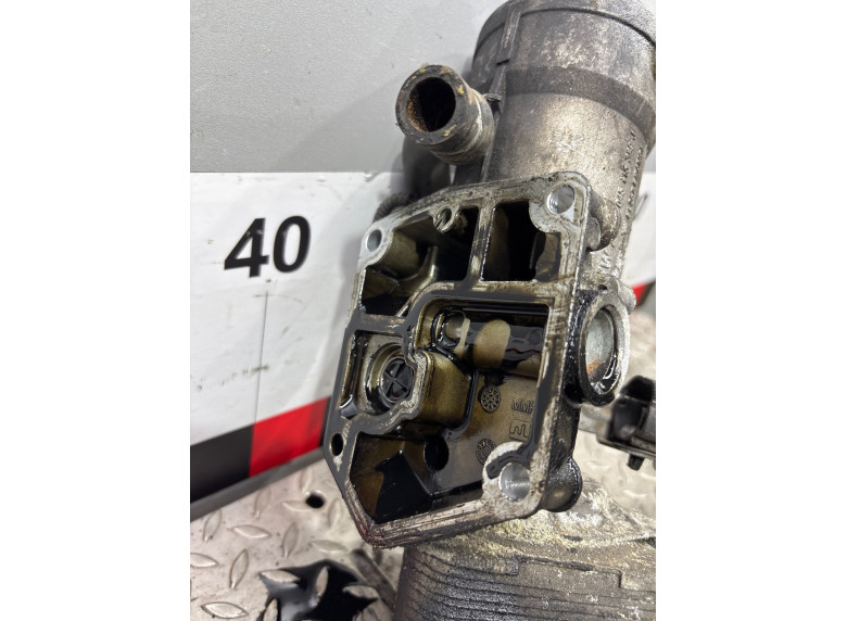 Корпус масляного фильтра к Volkswagen Passat, 2010г.