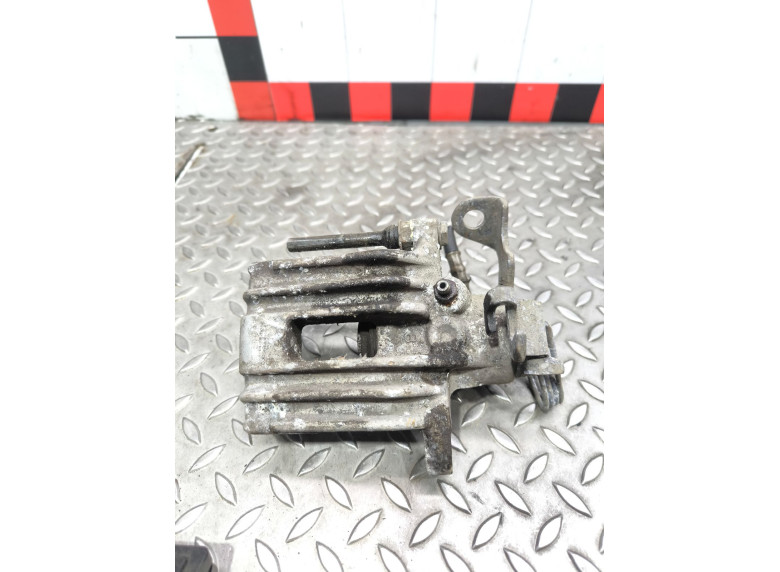 Суппорт задний левый к Volkswagen Passat, 2000г.