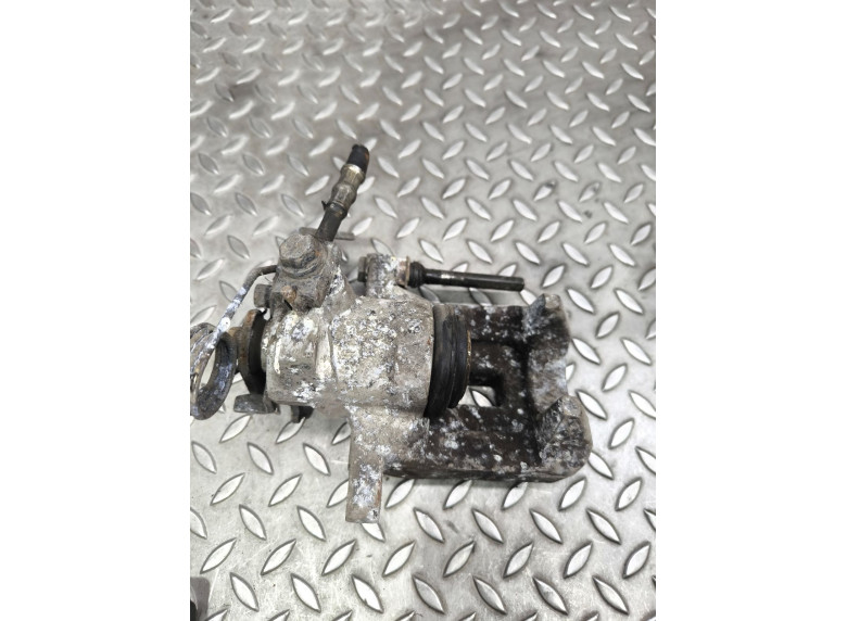 Суппорт задний левый к Volkswagen Passat, 2000г.