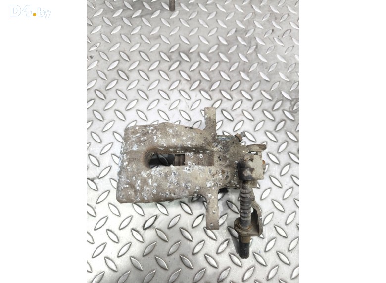 Суппорт задний левый к Opel Astra undefined г.