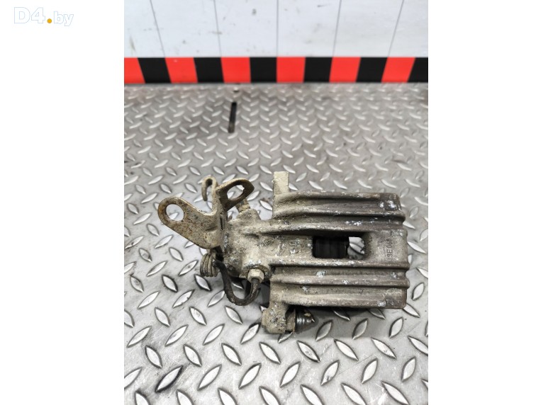 Суппорт задний левый к Volkswagen Golf undefined г.