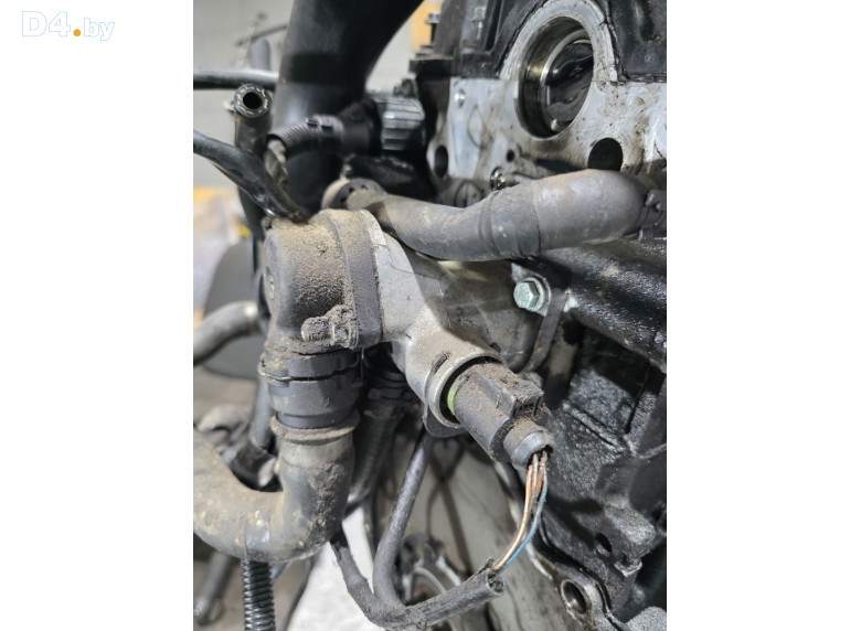 Фланец (тройник) системы охлаждения к Audi A6 undefined г.