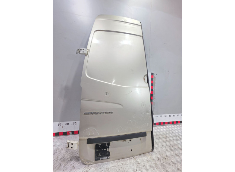 Накладка подсветки номера к Mercedes Sprinter, 2009г.