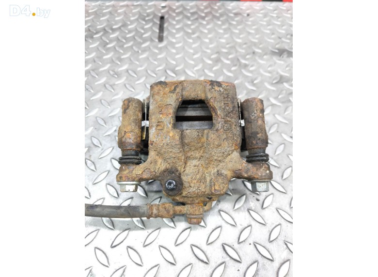 Суппорт задний правый к Nissan Tiida undefined г.