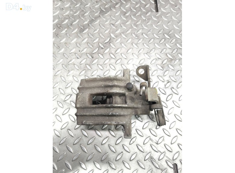 Суппорт задний левый к Volkswagen Passat undefined г.