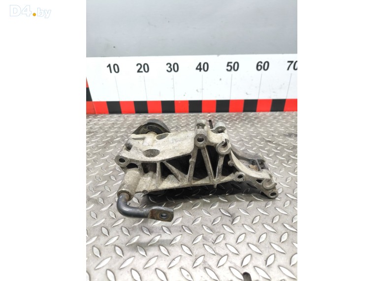 Натяжитель ремня генератора к Volkswagen Passat undefined г.