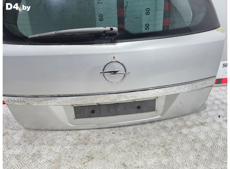 Накладка подсветки номера к Opel Astra undefined г.