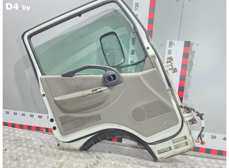 Обшивка двери передней левой (дверная карта) к Nissan Cabstar undefined г.