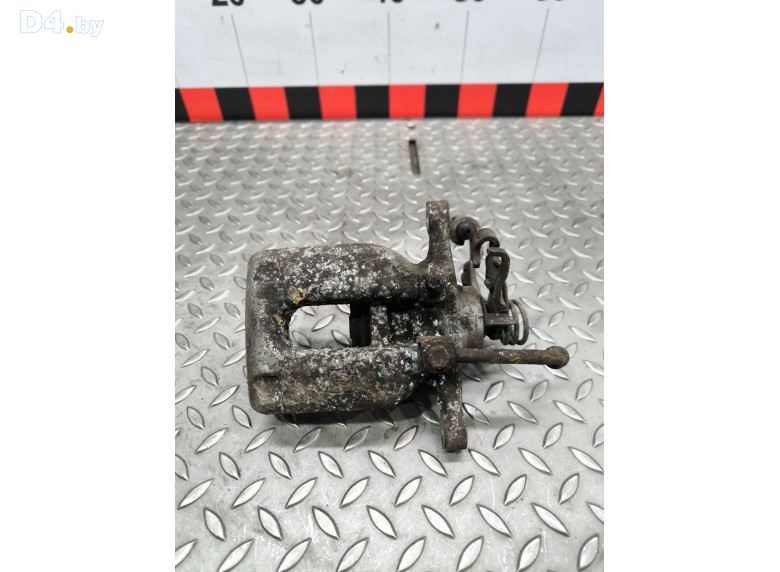 Суппорт задний левый к Opel Astra undefined г.