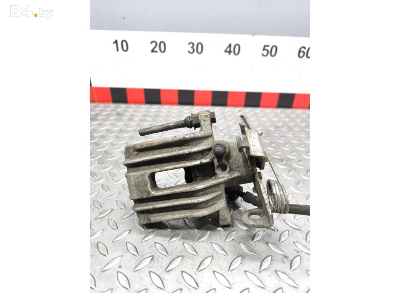 Суппорт задний левый к Volkswagen Passat undefined г.