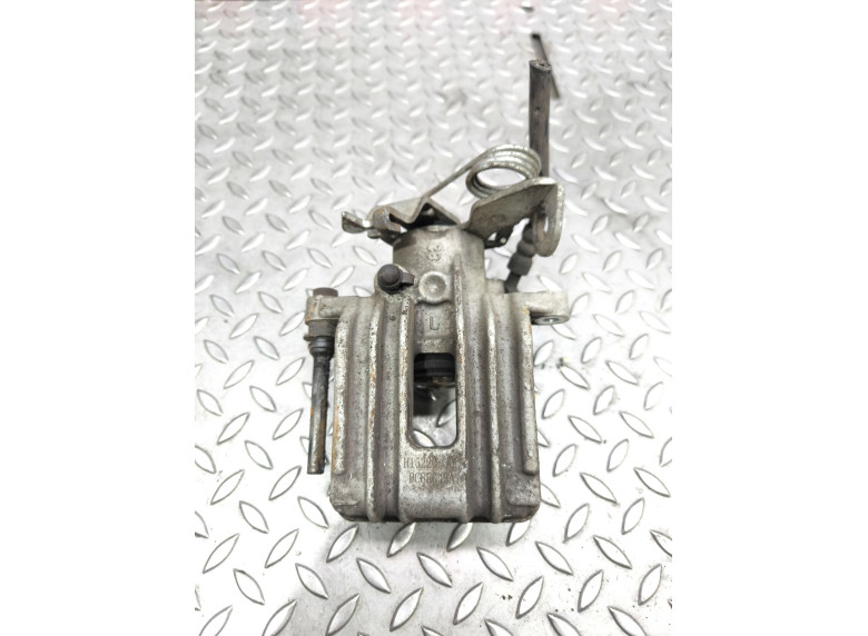 Суппорт задний левый к Volkswagen Passat, 2002г.