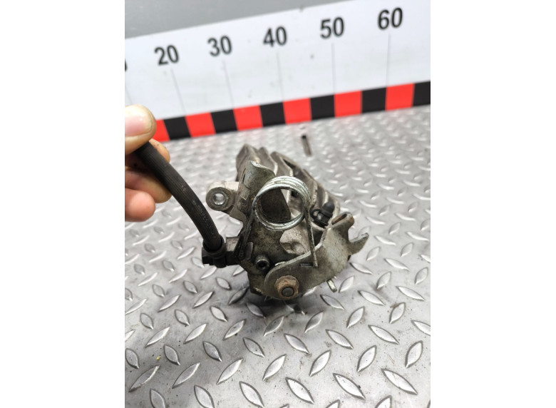 Суппорт задний левый к Volkswagen Passat, 2002г.