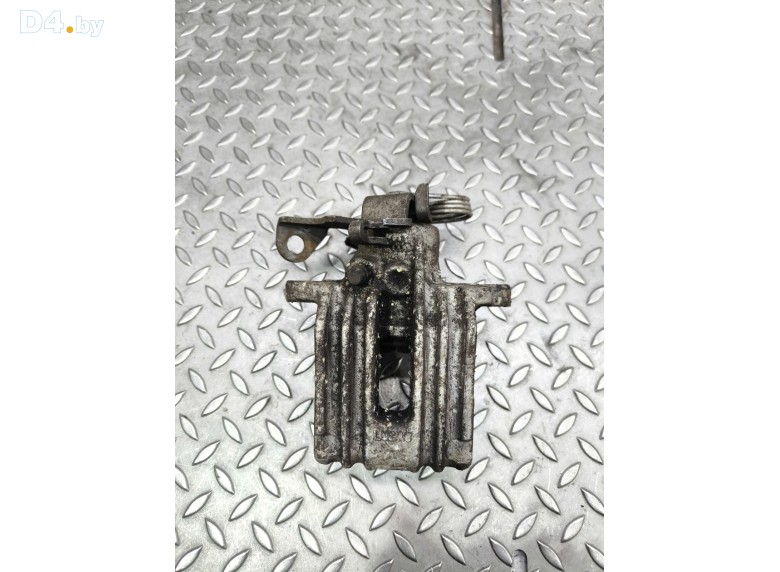 Суппорт задний левый к Volkswagen Passat undefined г.