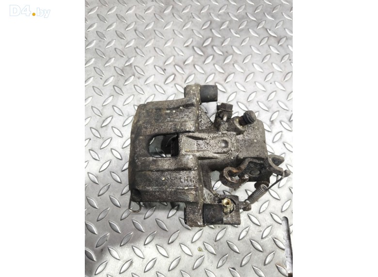 Суппорт задний левый к Toyota Yaris undefined г.