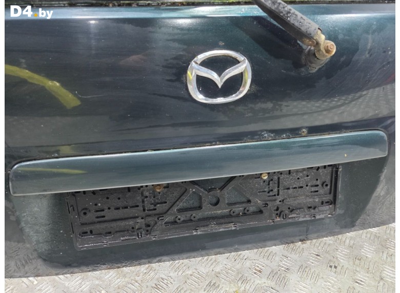 Накладка подсветки номера к Mazda Demio undefined г.