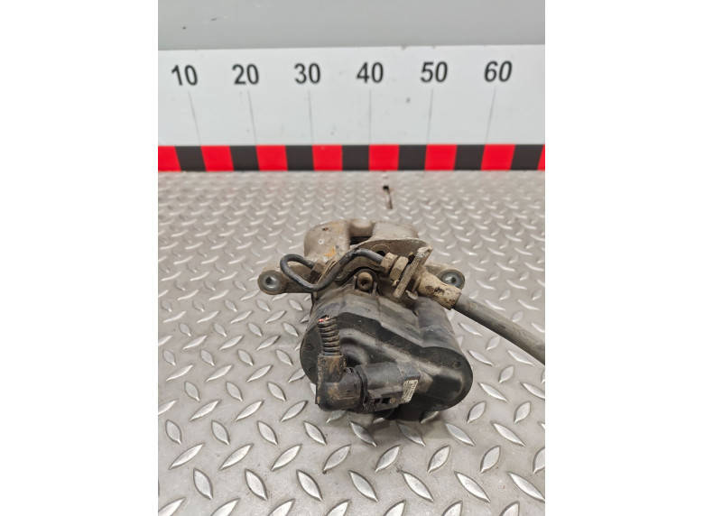 Суппорт задний правый к Volkswagen Passat, 2006г.