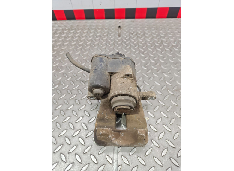 Суппорт задний левый к Volkswagen Passat, 2006г.