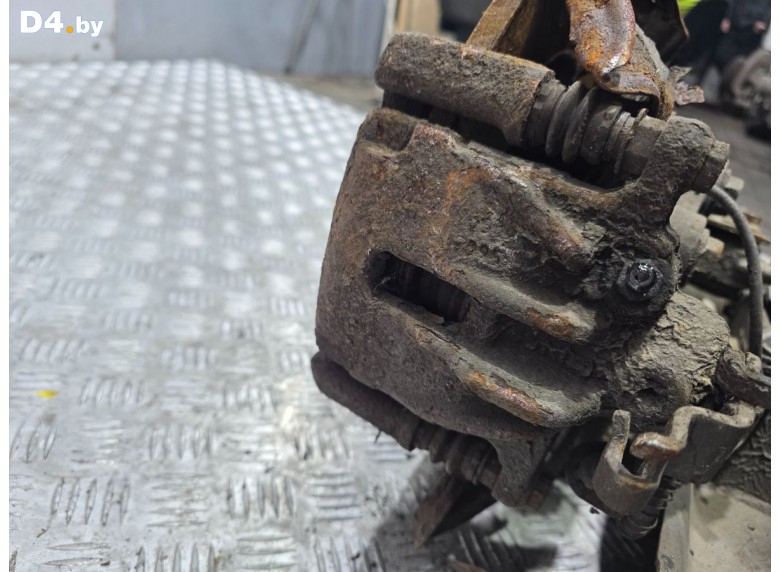 Суппорт задний левый к Opel Vivaro undefined г.