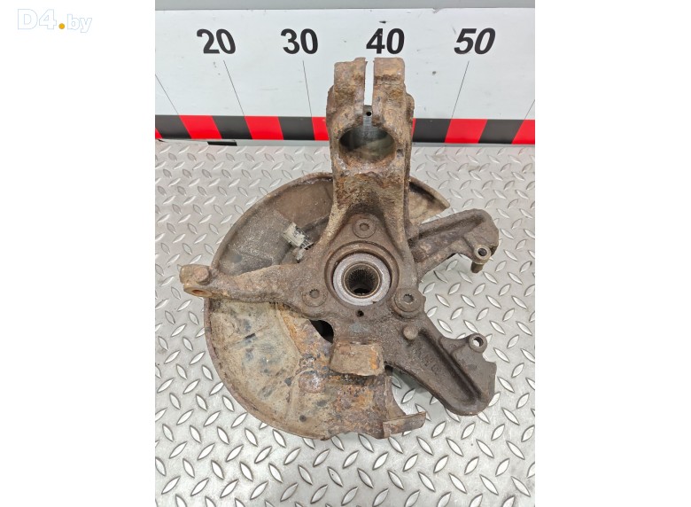 Кулак поворотный левый к Volkswagen Caddy undefined г.