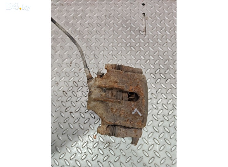 Суппорт передний левый к Renault Scenic 1998 г.