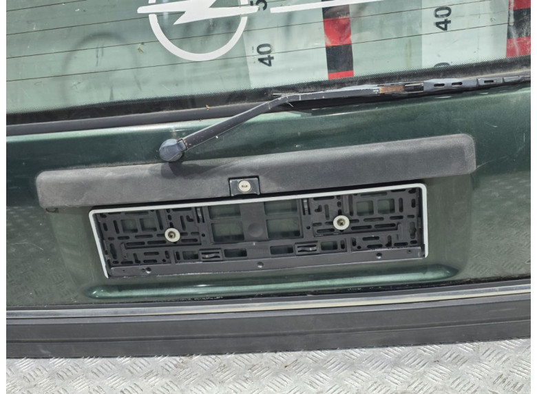 Накладка подсветки номера к Opel Omega, 1994г.