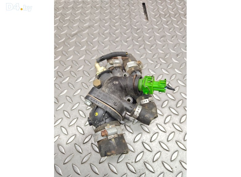 Корпус термостата к Volvo V40 1998 г.