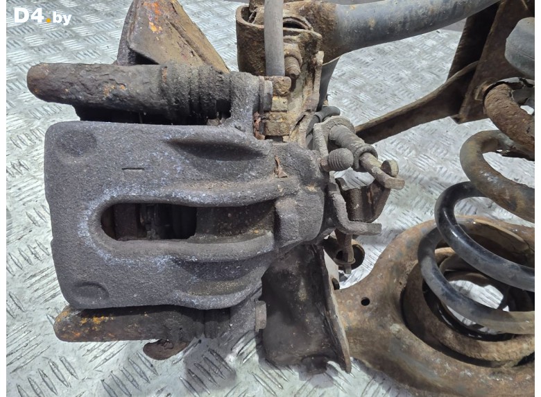 Суппорт задний левый к Ford Focus 2003 г.