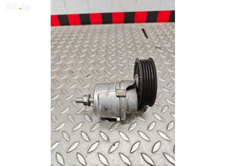 Натяжитель ремня генератора к Volkswagen Passat 1998 г.