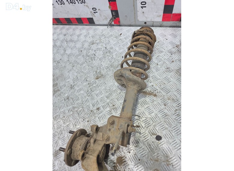 Амортизатор задний левый к Mazda 626 1999 г.