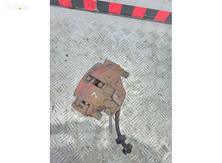 Суппорт передний левый к Audi 100 1988 г.