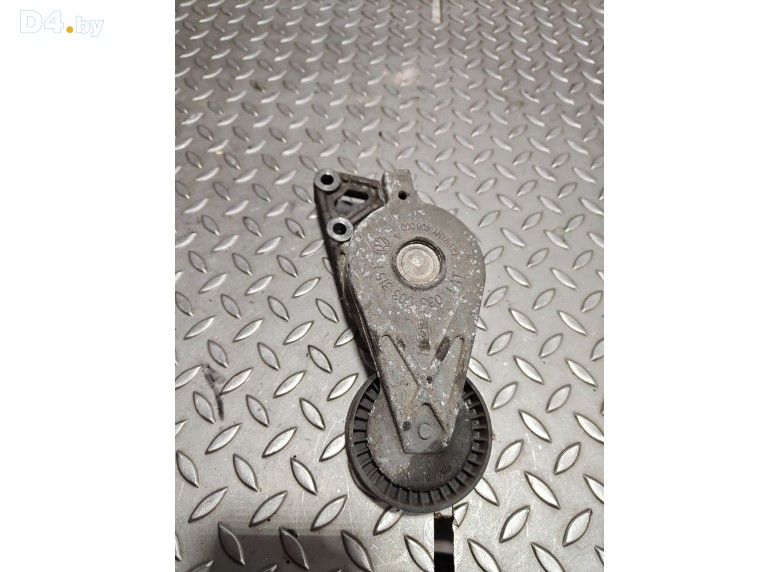 Натяжитель ремня генератора к Volkswagen Golf 2001 г.