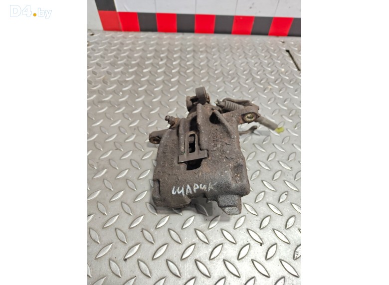 Суппорт задний левый к Volkswagen Transporter 2000 г.