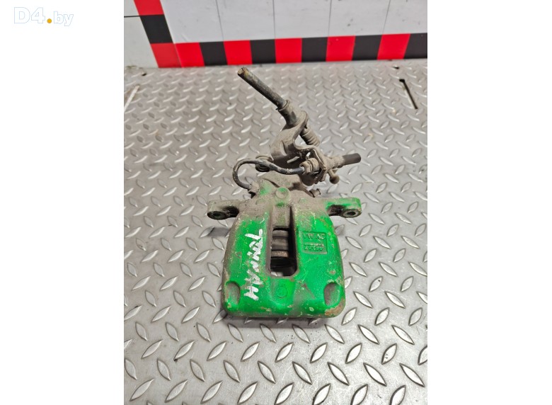 Суппорт задний левый к Volkswagen Touran 2006 г.