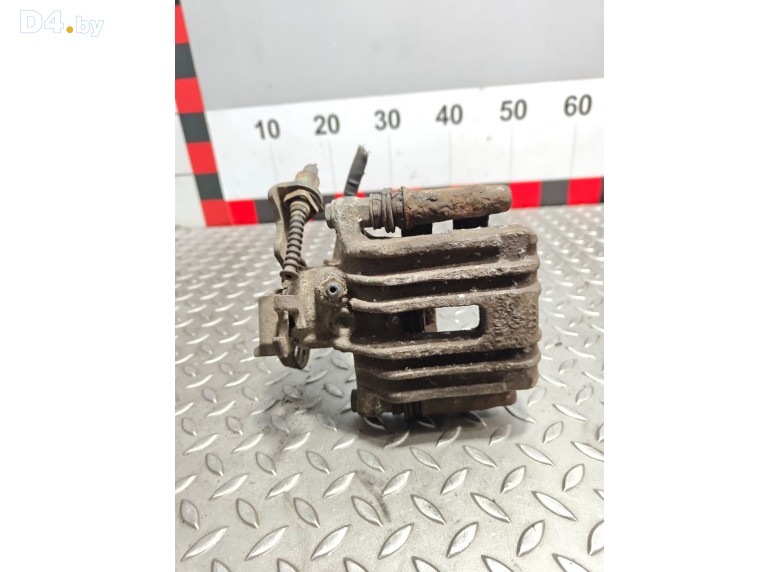 Суппорт задний правый к Volkswagen Passat 2000 г.