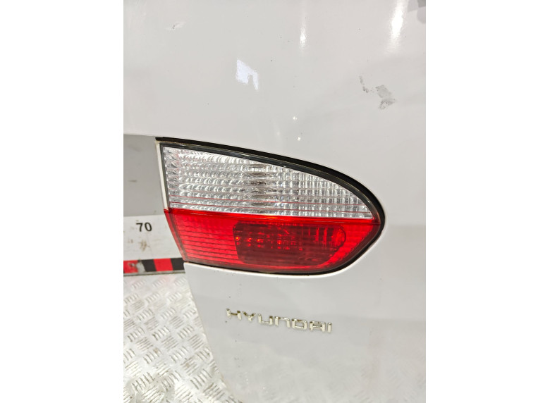 Фонарь крышки багажника левый к Hyundai H200, 2002г.