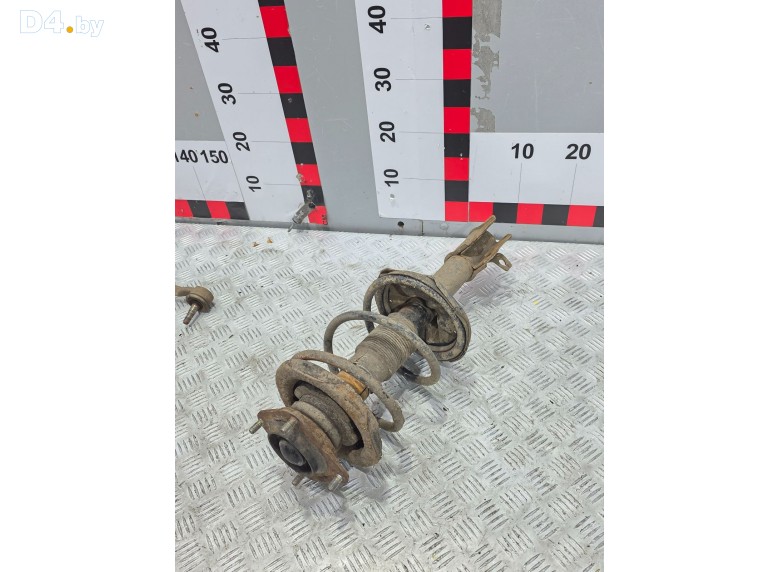 Амортизатор передний левый к Mazda 626 1998 г.