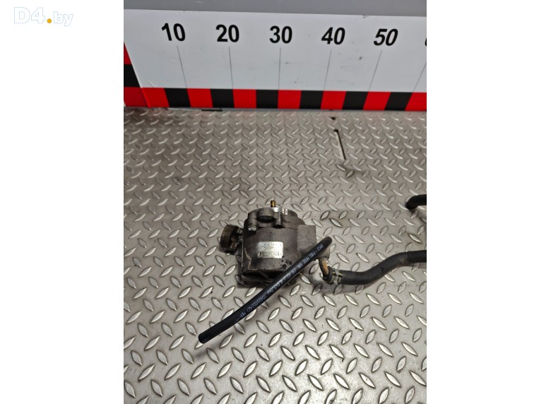 Насос вакуумный к Mazda 626 1999 г.