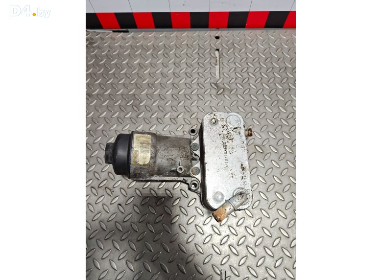 Теплообменник масляного фильтра к Opel Omega 2000 г.