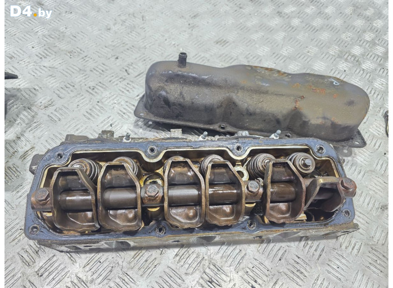 Головка блока цилиндров к Chrysler Voyager 1999 г.