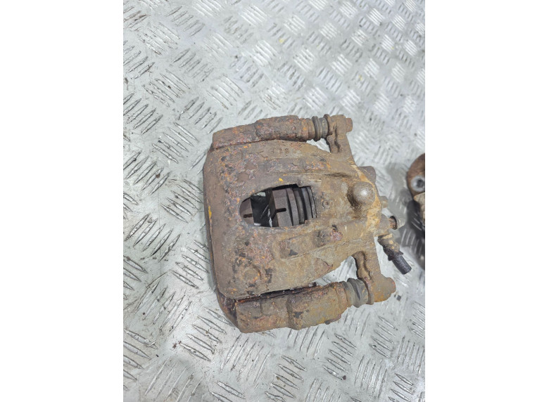 Суппорт передний левый к Opel Corsa, 2003г.