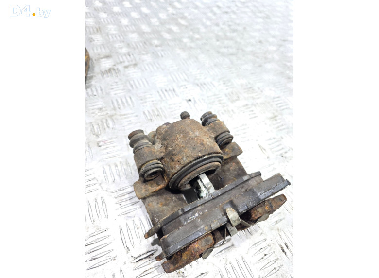 Суппорт передний правый к Chrysler Voyager 1998 г.