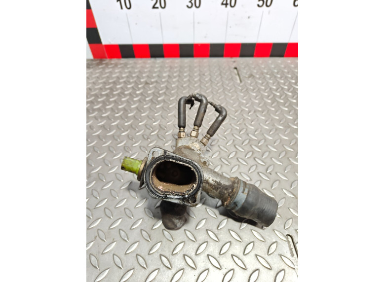 Фланец (тройник) системы охлаждения к Volkswagen Golf, 2002г.