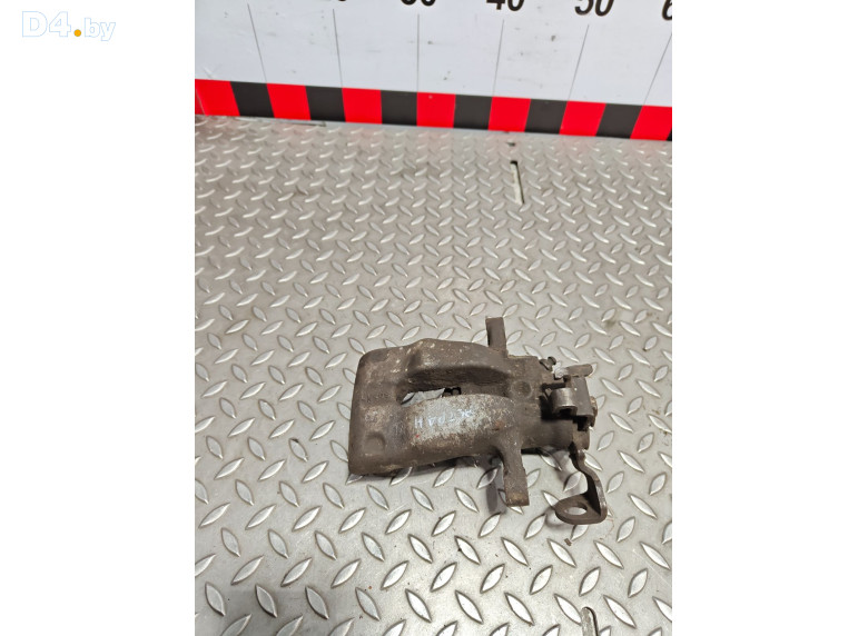 Суппорт задний левый к Opel Astra 2005 г.