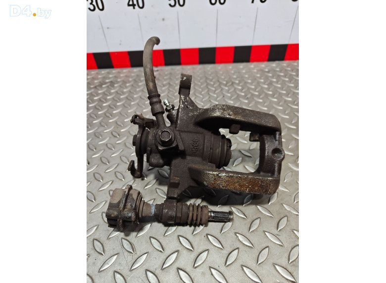 Суппорт задний правый к Opel Astra 2010 г.